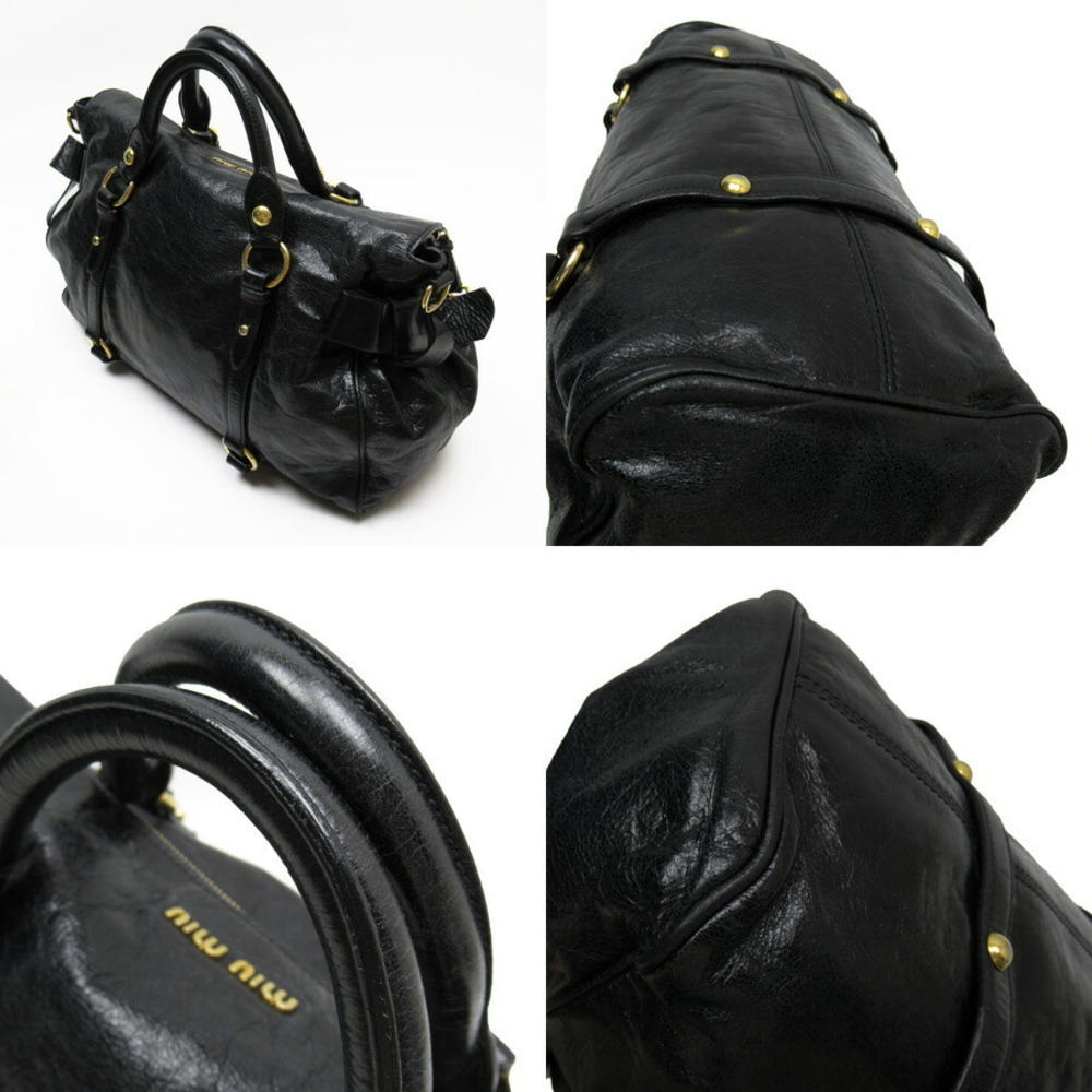 Miu Miu black handbag gold leather